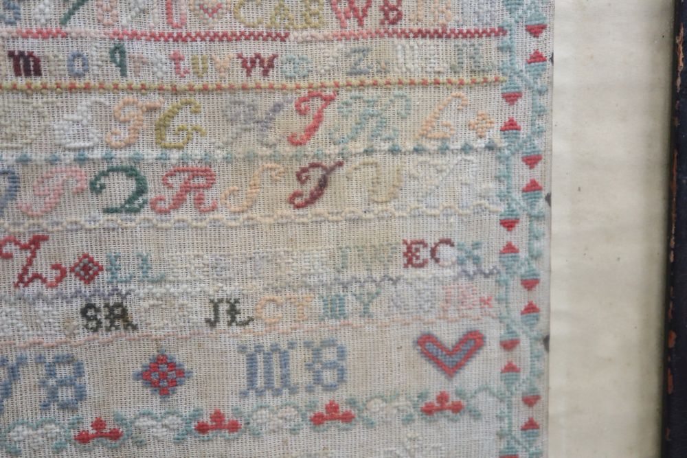 A needlework sampler dated 1886, framed as a firescreen, overall height 71cm